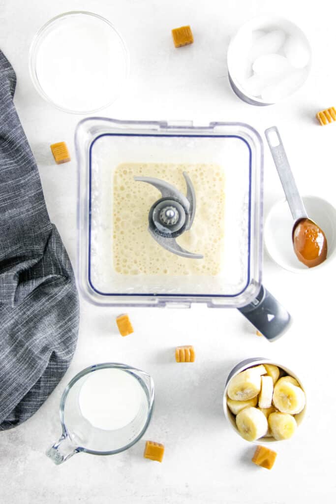 Banana Caramel Smoothie is fresh and creamy! Made with just 5 ingredient, this smoothie will help you power through the day! Ingredients in blender.