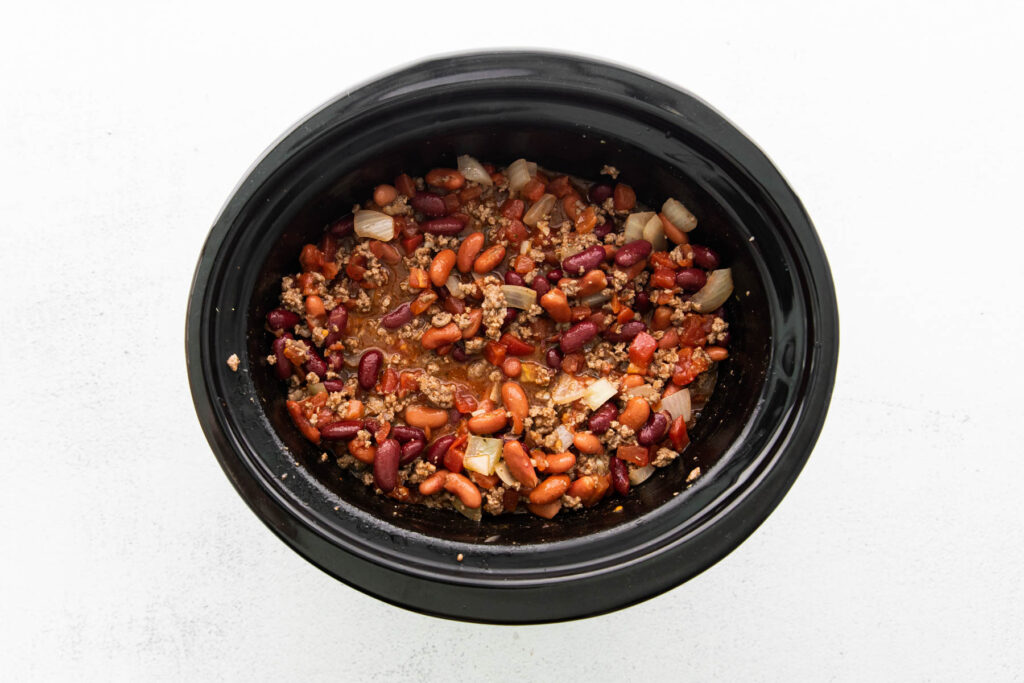 chili ingredients in slow cooker.