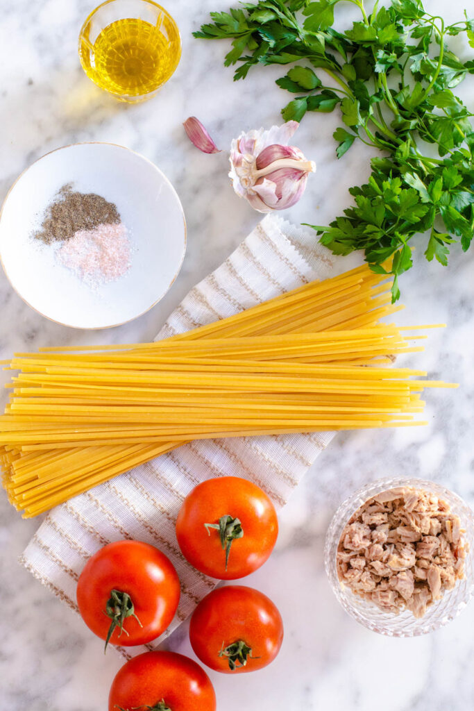 This easy Tuna Pasta With Tomatoes is perfect for a quick meal! With fresh tomatoes and parsley, this pasta can easily be modified! Tuna Pasta with Tomato Ingredients