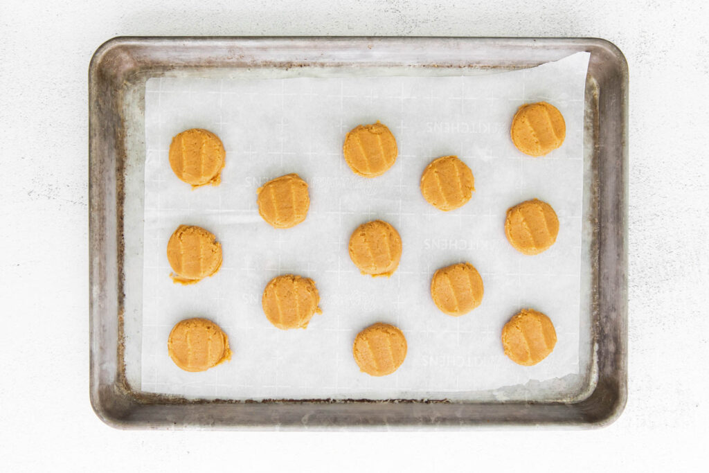 uncooked cookies on cookie pan.