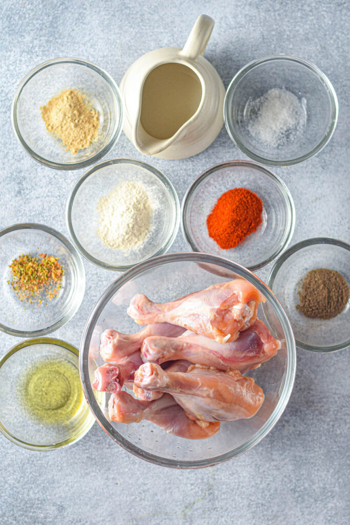Instant Pot Chicken Drumsticks are so juicy and tender and can be made in no time. Perfectly seasoned and cooked to perfection Instant Pot Chicken Drumsticks ingredients in glass bowls.