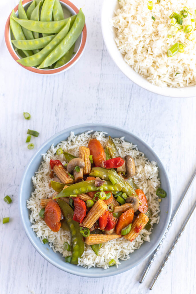 Easy Instant Pot Vegetable Stir Fry filled with hearty vegetables, covered in a sweet and savory sauce. overhead vegetable stir fry.