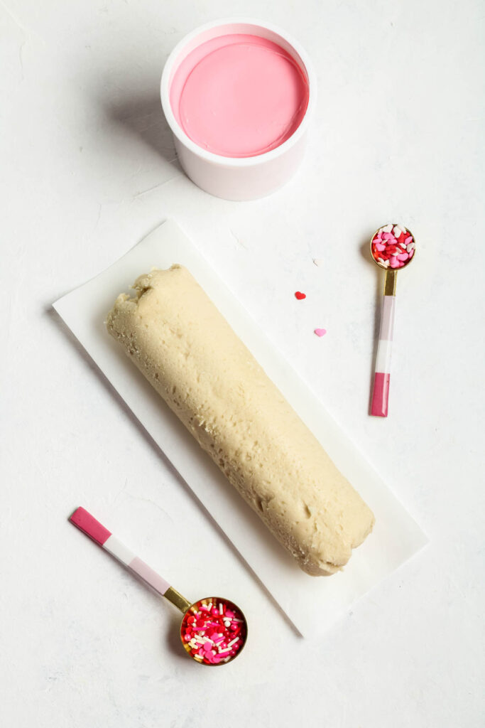 Easy Strawberry Frosted Cookie Bars made with 3 ingredients! Perfect for an easy treat that even the kids can make! Strawberry Frosted Cookie Bars ingredients on white background.
