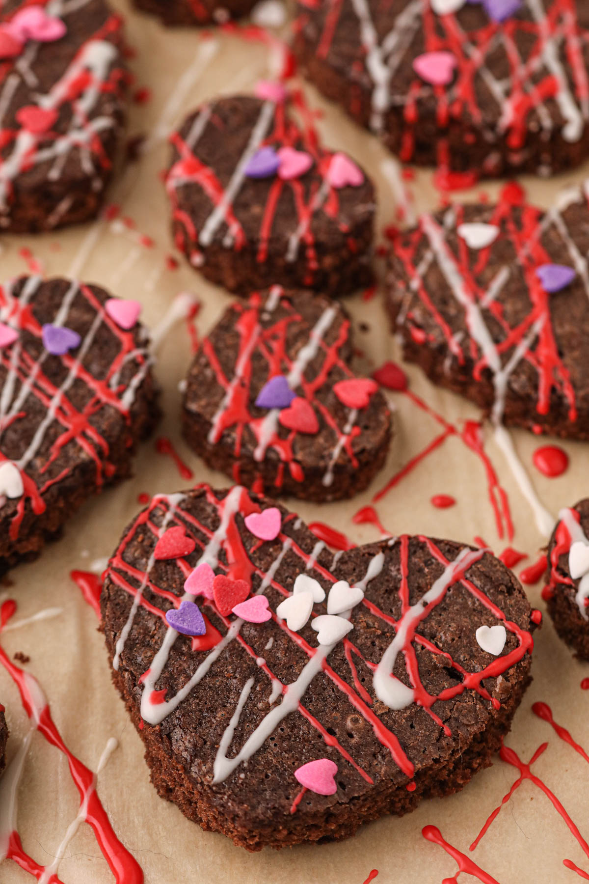 Valentines Day Brownies topped with sprinkles and melted candy melts.