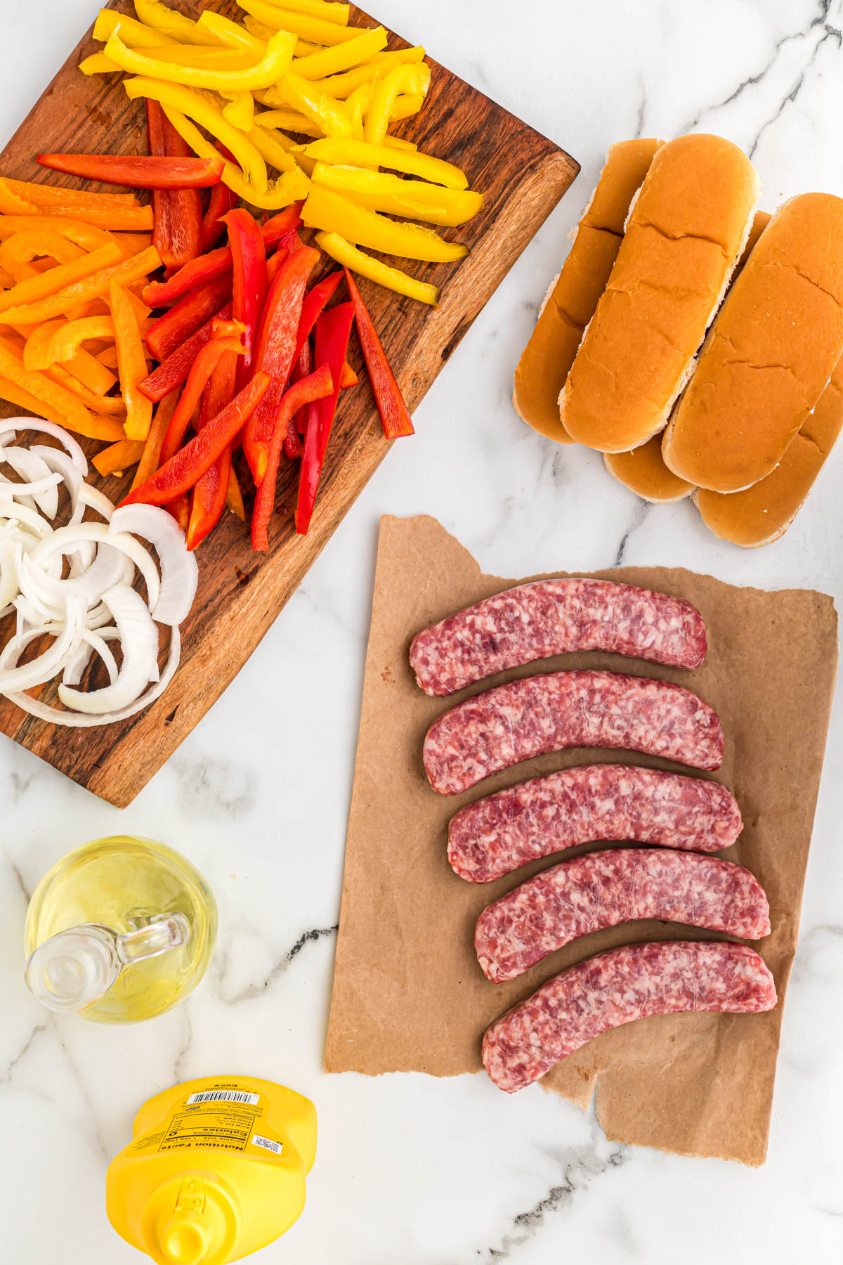Air Fryer Bratwurst ingredients on white background.