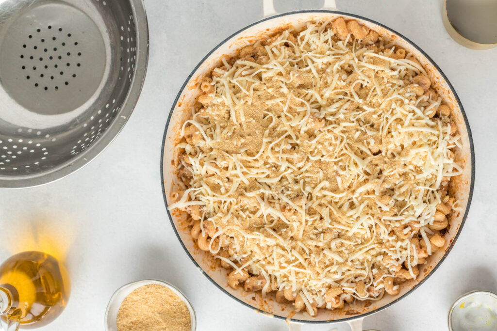 pasta casserole topped with bread crumbs and cheese.