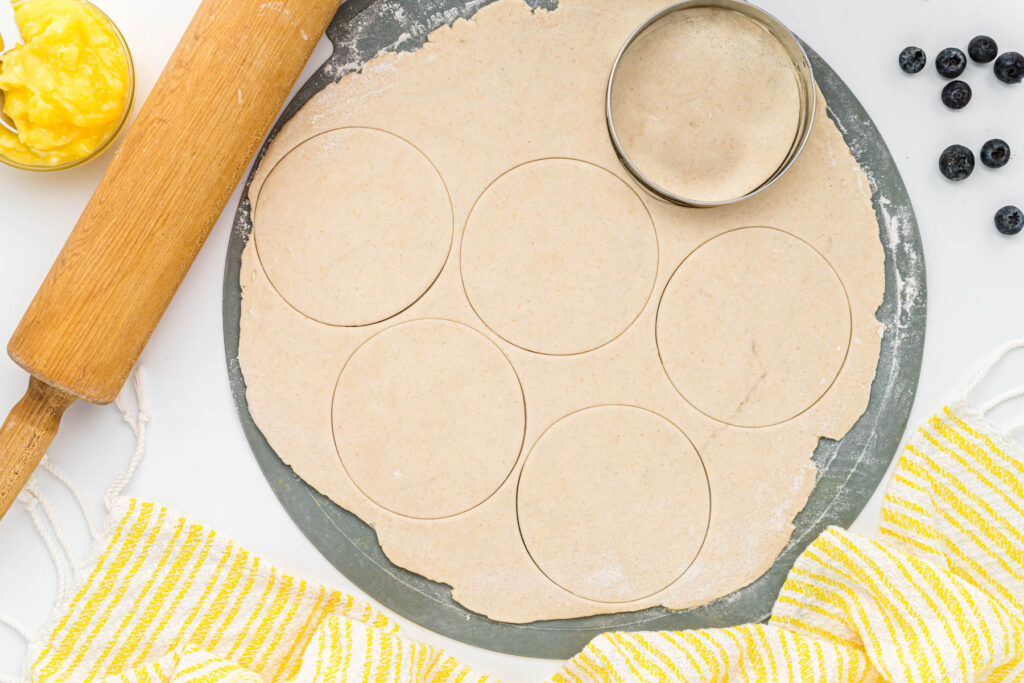 cutting dough for turnovers.