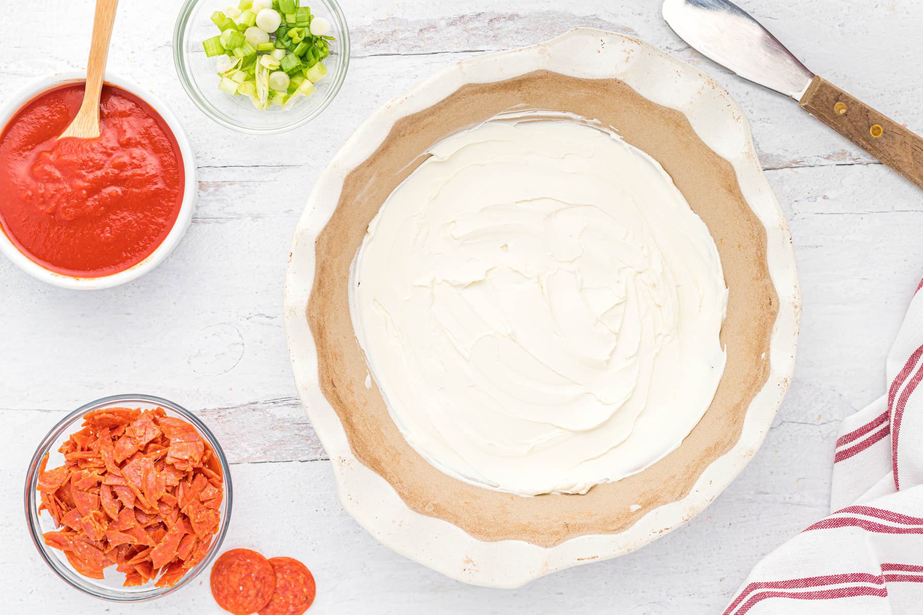 cream cheese in baking dish.