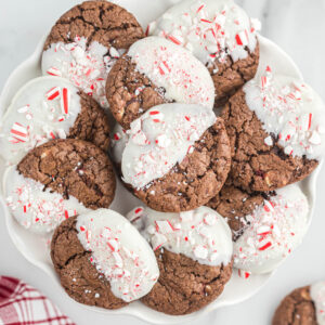 peppermint bark cookies on white tray.