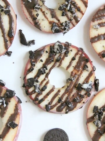 Chocolate Oreo Apple Donuts on white background
