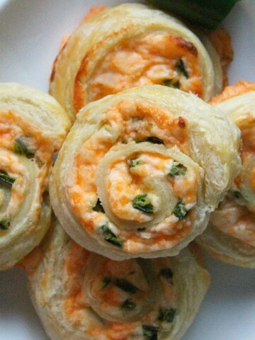 Puff Pastry Jalapeno Popper Pinwheels on white plate