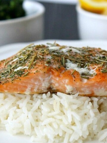 Baked Herbed Salmon on white plate