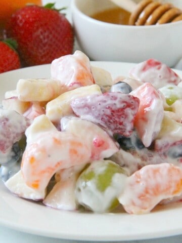 Creamy Yogurt Fruit Salad on white plate