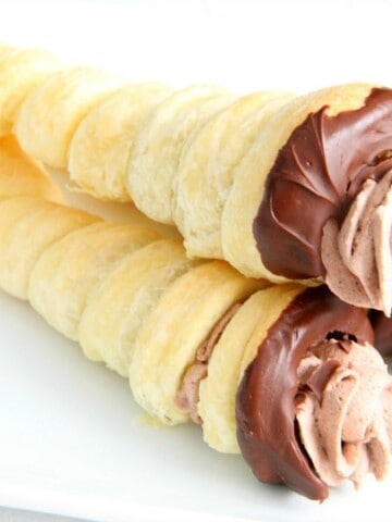 Chocolate Cream Horns on white plate