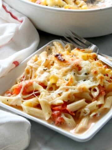 Cheesy Tomato Pasta Bake on white plate