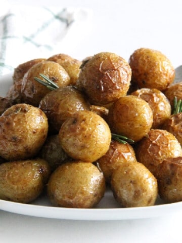 Spicy Roasted Rosemary Potatoes on white plate