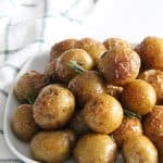Spicy Roasted Rosemary Potatoes on white plate