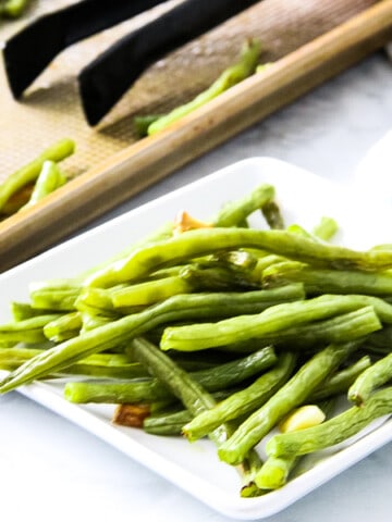 Sheet Pan Roasted Green Beans on white plate