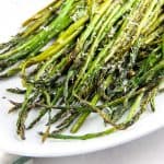 Sheet Pan Roasted Asparagus on white platter