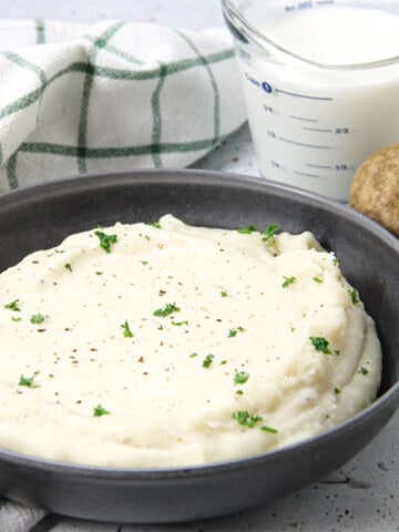 Pressure Cooker Potatoes with Gravy in gray bowl