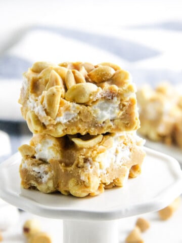 close up of salted nut roll bars on stand