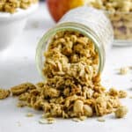 granola spilling out of mason jar.
