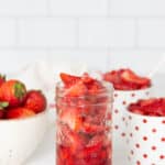 Easy Strawberry Sauce Recipe in glass jar.