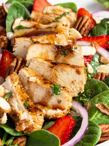 Strawberry Chicken Spinach Salad in bowl.