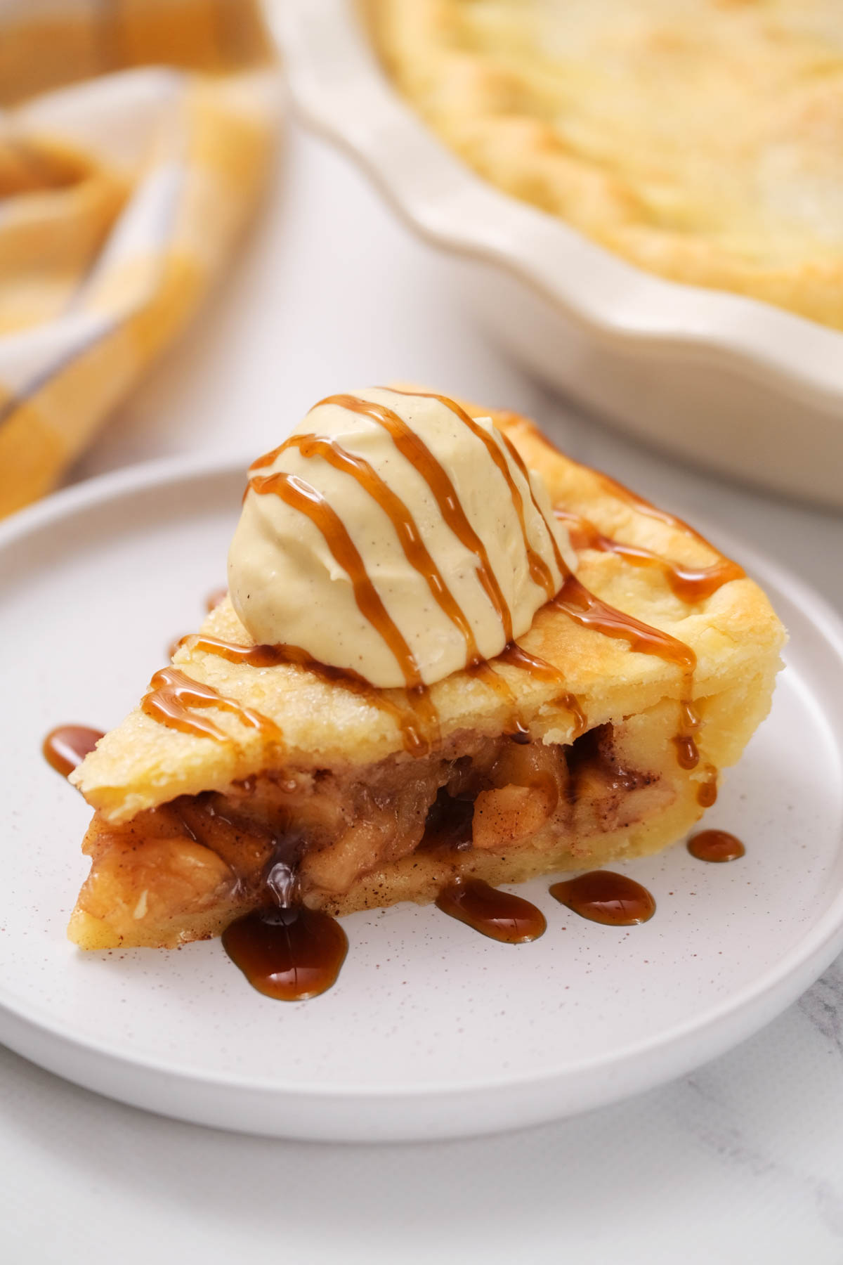 slice of pie on white plate.