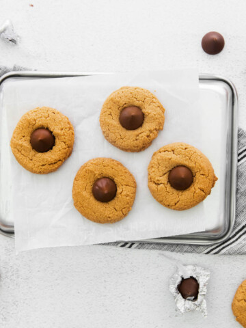 Peanut Butter Blossom Cookies cooked on sheet pan.