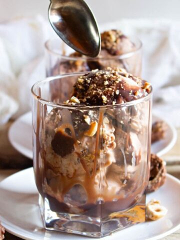 dipping spoon into ice cream.