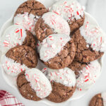 peppermint bark cookies on white tray.