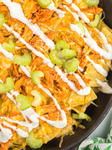 buffalo chicken skillet nachos in pan